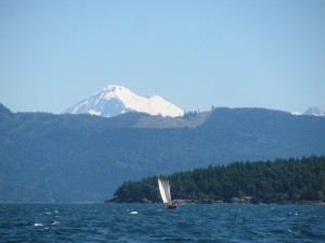 Long boat with Mt Baker